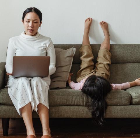 Parent and child on couch