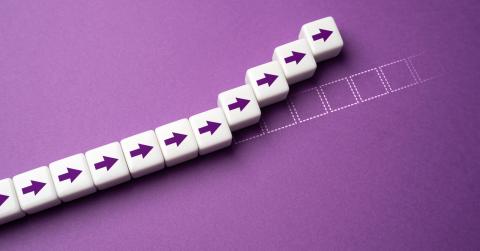Purple background with white arrows moving forward and up