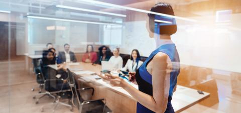 Woman leading a business meeting